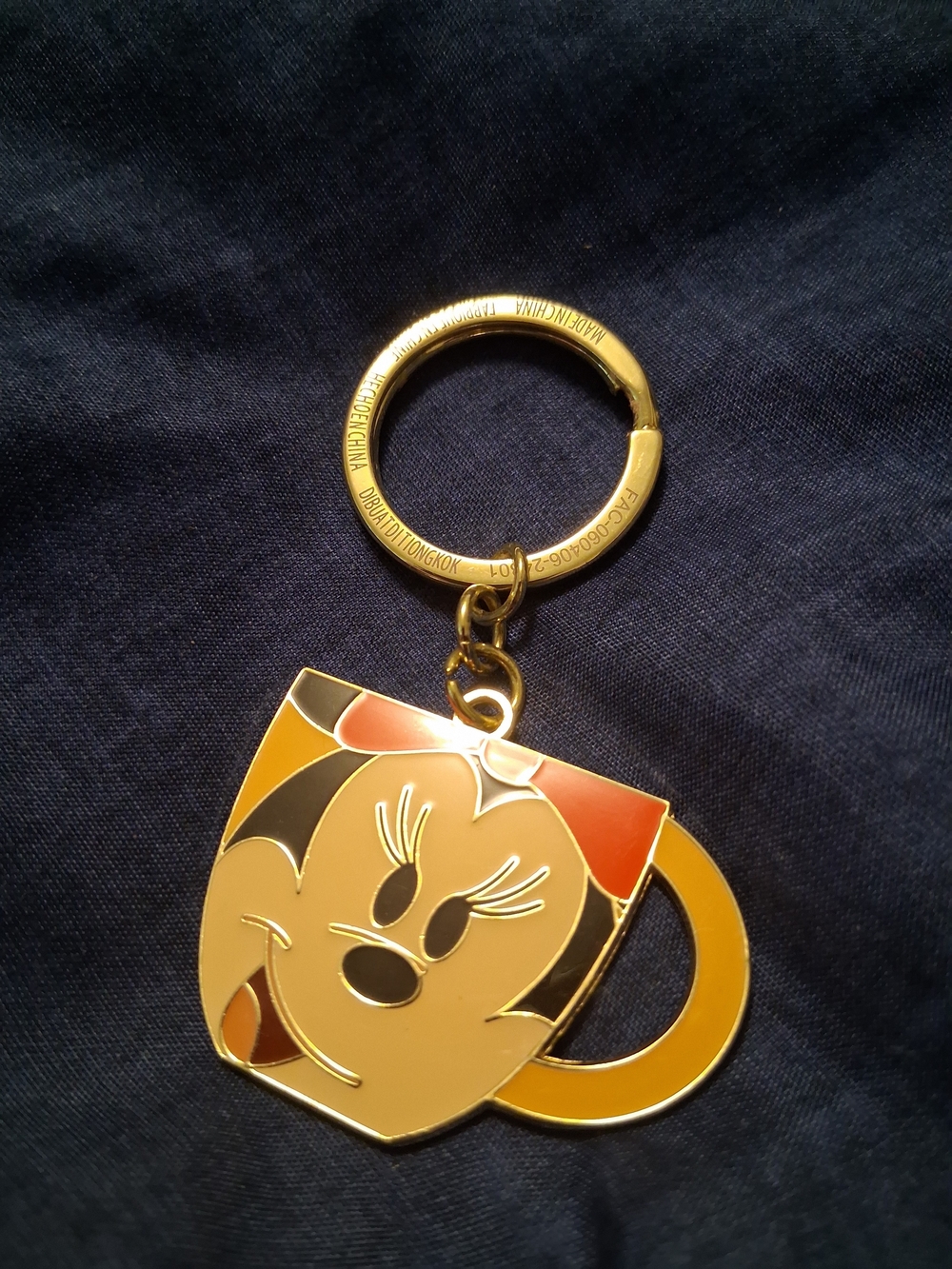 Disney Minnie Mouse Gold-tone Enamel Keychain with Red and Yellow Accents